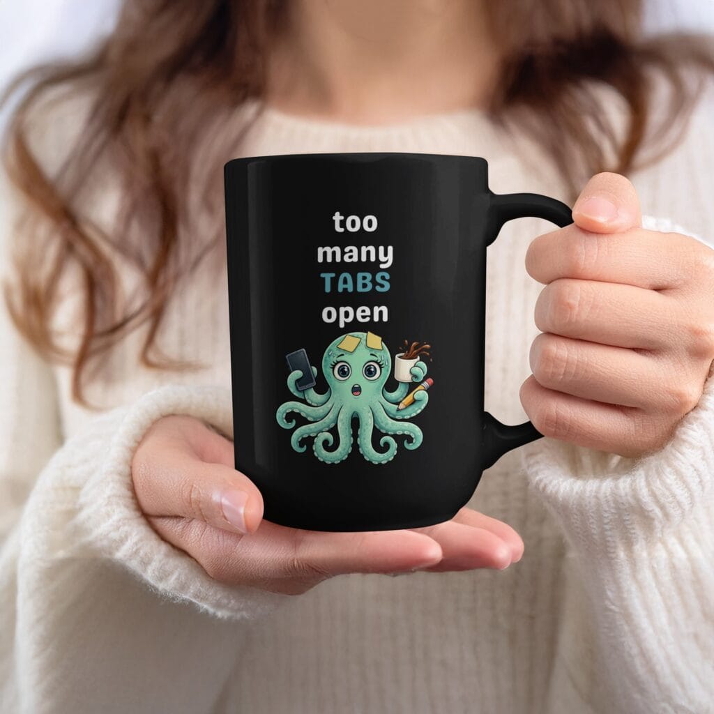 Black mug featuring the phrase "My Brain Has Too Many Tabs Open" with a teal overwhelmed octopus.